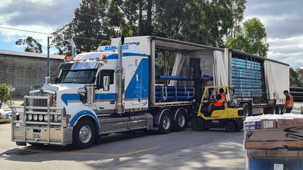 Civilpipes truck carrying civil pipes Civilpipes truck carrying civil pipes